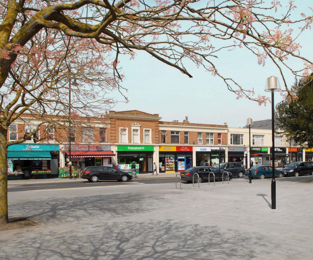 Manor Parade is a row of 21 shops dating from the 1920s, restored to designs by DK-CM as part of Southall Great Streets Phase 2.